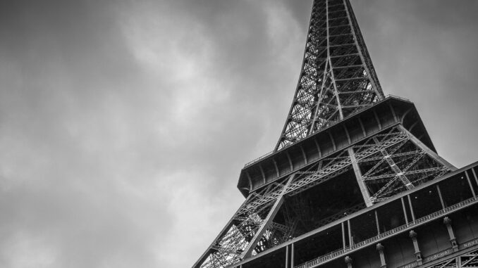 Photo of the Eiffel Tower as the AI Action Summit 2025 kicks off in Paris, France where global leaders are discussing how to ensure artificial intelligence development continues in a responsible and equitable manner with ethics at its heart that addresses issues such as bias while unlocking its potential for innovation in areas such as healthcare.