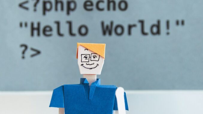 Papercraft toy with code in the background as LG AI Research has unveiled EXAONE Deep, a reasoning artificial intelligence model that excels in complex problem-solving across maths, science, and coding.